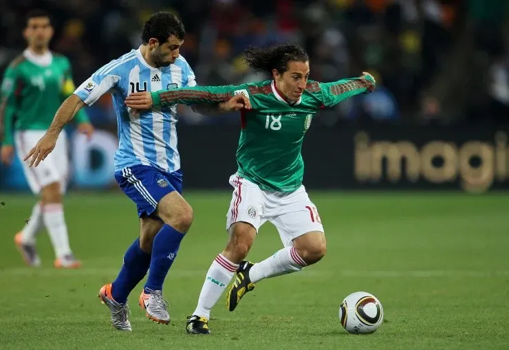 Andrés Guardado y Mascherano