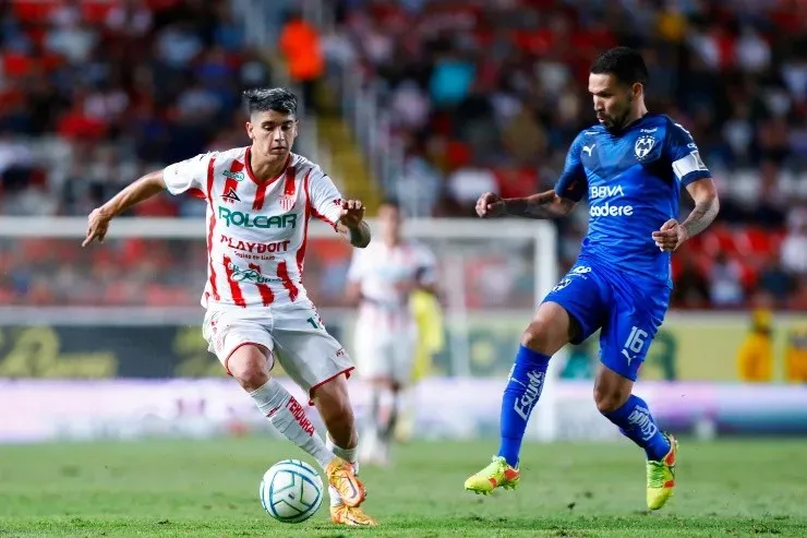 AGUASCALIENTES, MEXICO - AUGUST 12: Angelo Araos of Necaxa competes for the ball with Celso Ortiz of Monterrey during the 8th round match between Necaxa and Monterrey as part of the Torneo Apertura 2022 Liga MX at Victoria Stadium on August 12, 2022 in Aguascalientes, Mexico. (Photo by Leopoldo Smith/Getty Images)-Not Released (NR)