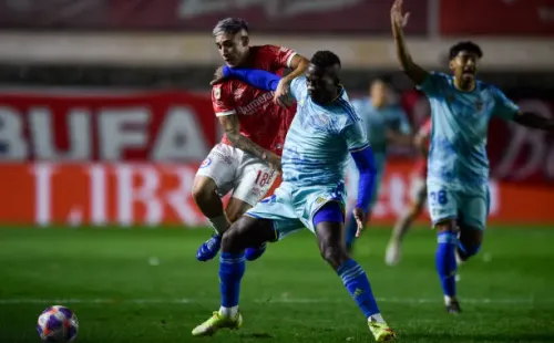 Luis Advincula of Boca Juniors fights for the ball with Santiago Montiel of Argentinos Juniors during a match between Argentinos Juniors and Boca...