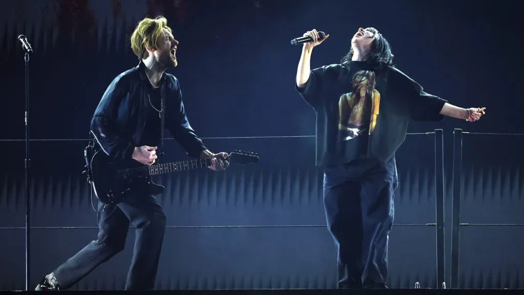 FINNEAS and Billie Eilish perform onstage during the 64th Annual GRAMMY Awards. (Source: Rich Fury/Getty Images for The Recording Academy)