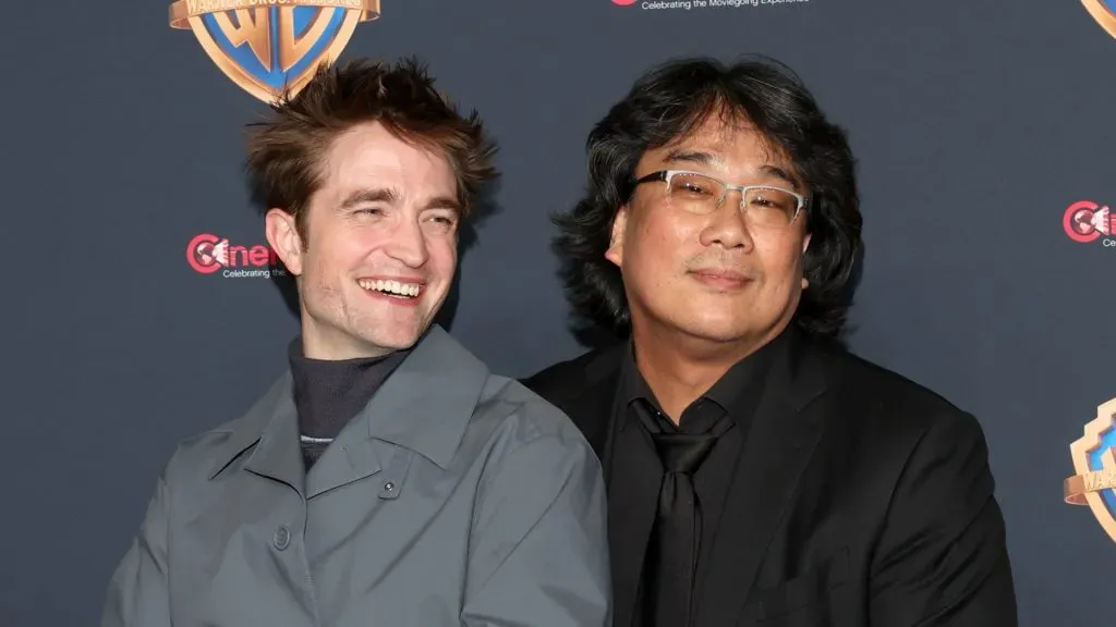 Robert Pattinson and Bong Joon-ho at the 2024 CinemaCon (Gabe Ginsberg/Getty Images)