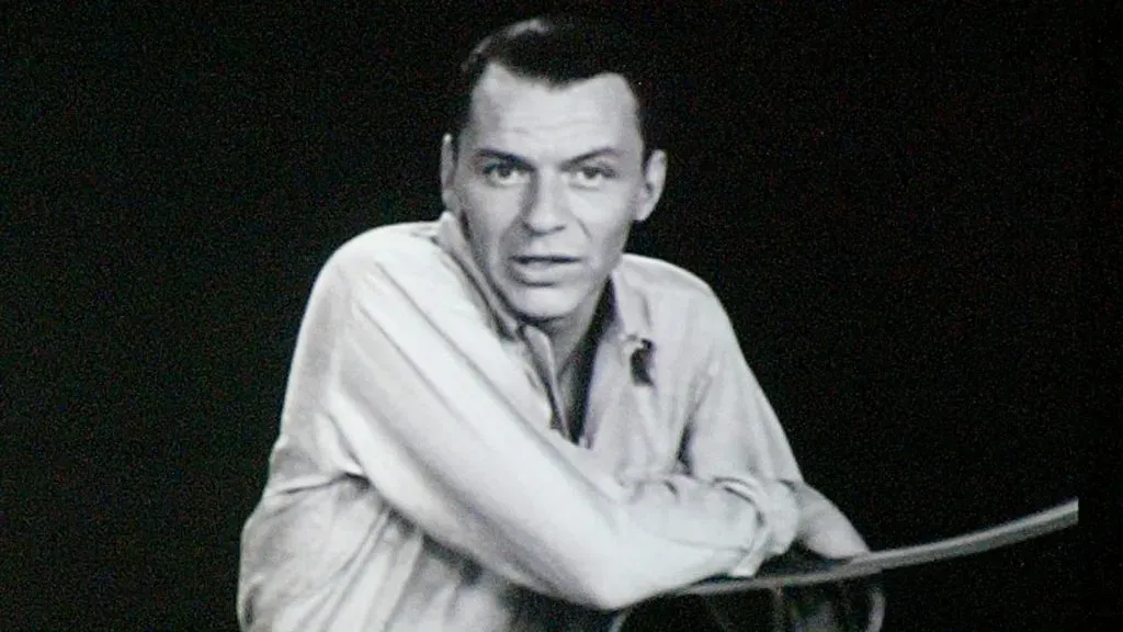 Image of singer Frank Sinatra appears on 40 foot high movable panels and screens during rehearsals for the “Sinatra: His Voice. His World. His Way” gala. (Source: Evan Agostini/Getty Images)