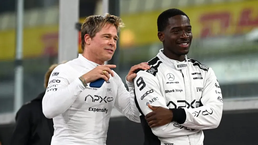 Brad Pitt, star of the upcoming Formula One based movie, F1, and Damson Idris, co-star of the upcoming Formula One based movie, F1 interact in the Paddock during previews ahead of the F1 Grand Prix of Abu Dhabi at Yas Marina Circuit on December 05, 2024 in Abu Dhabi, United Arab Emirates. (Photo by Clive Mason/Getty Images)