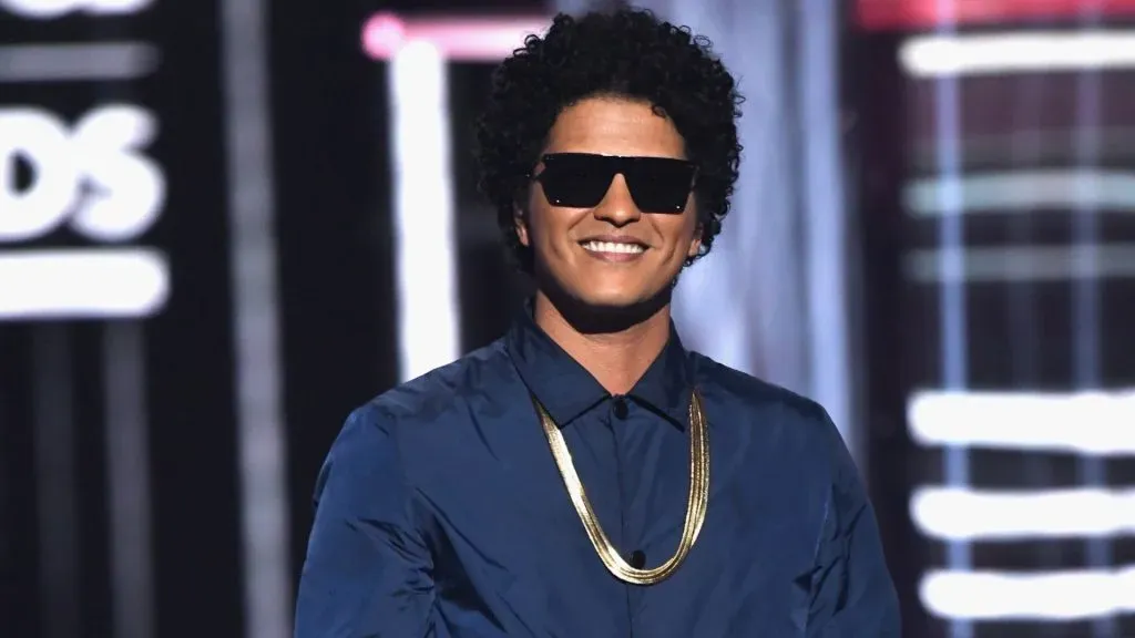 Bruno Mars speaks onstage during the 2018 Billboard Music Awards. (Source: Ethan Miller/Getty Images)