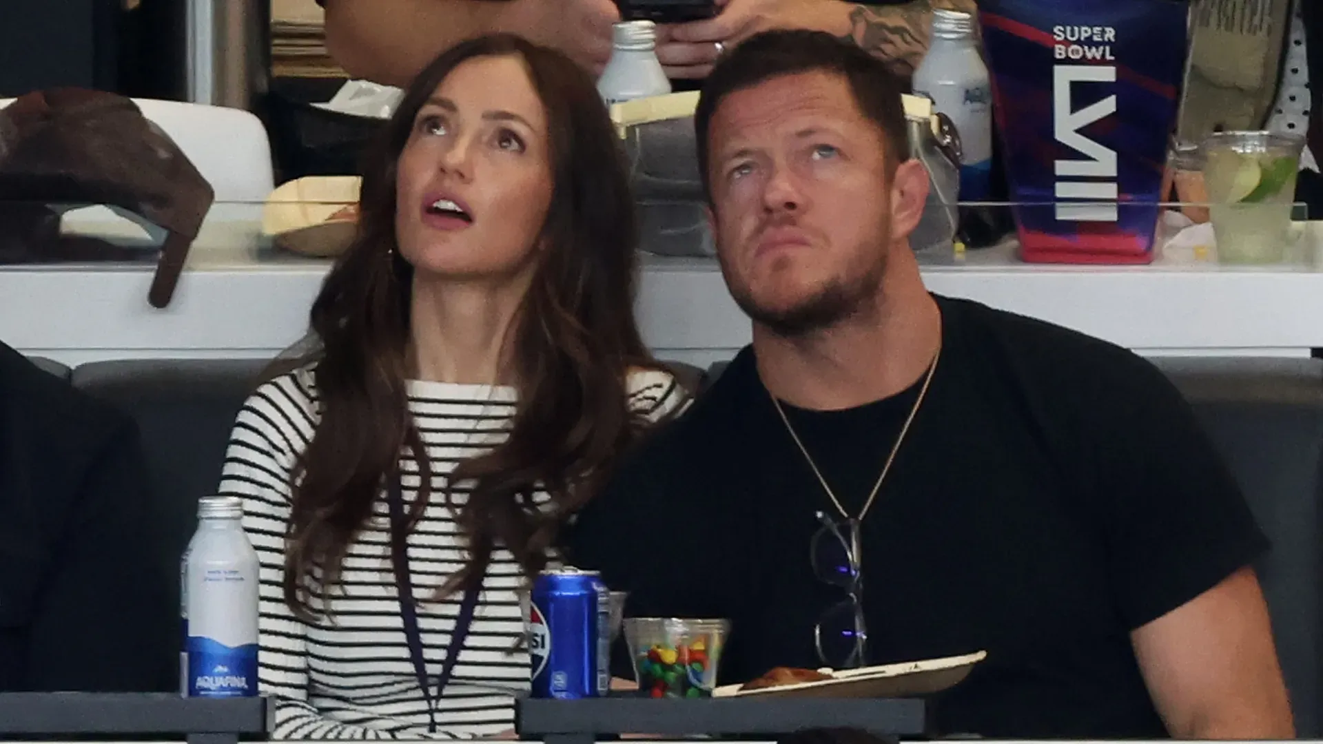 Minka Kelly and Dan Reynolds look on in the first quarter during Super Bowl LVIII in 2024. (Source: Rob Carr/Getty Images)