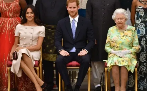 Isabel II con el Príncipe Harry y Meghan Markle. Foto: (Getty)
