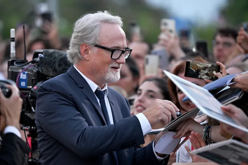 VENICE, ITALY – SEPTEMBER 03: Director David Fincher signs autographs for fans during a red carpet for the Netflix movie “The Killer” at the 80th Venice International Film Festival on September 03, 2023 in Venice, Italy. (Photo by Kate Green/Getty Images for Netflix)