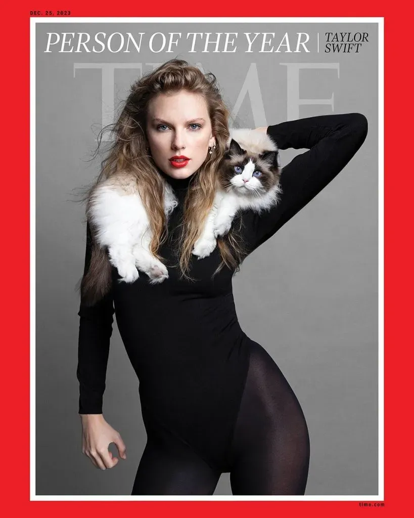 Taylor Swift junto a su gato en la portada de la revista Time.