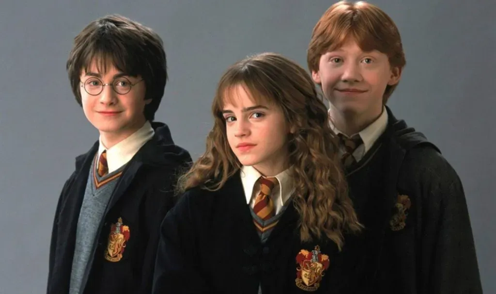 Daniel Radcliffe, Emma Watson y Rupert Grint, protagonistas de la saga original de Harry Potter. (IMDb)