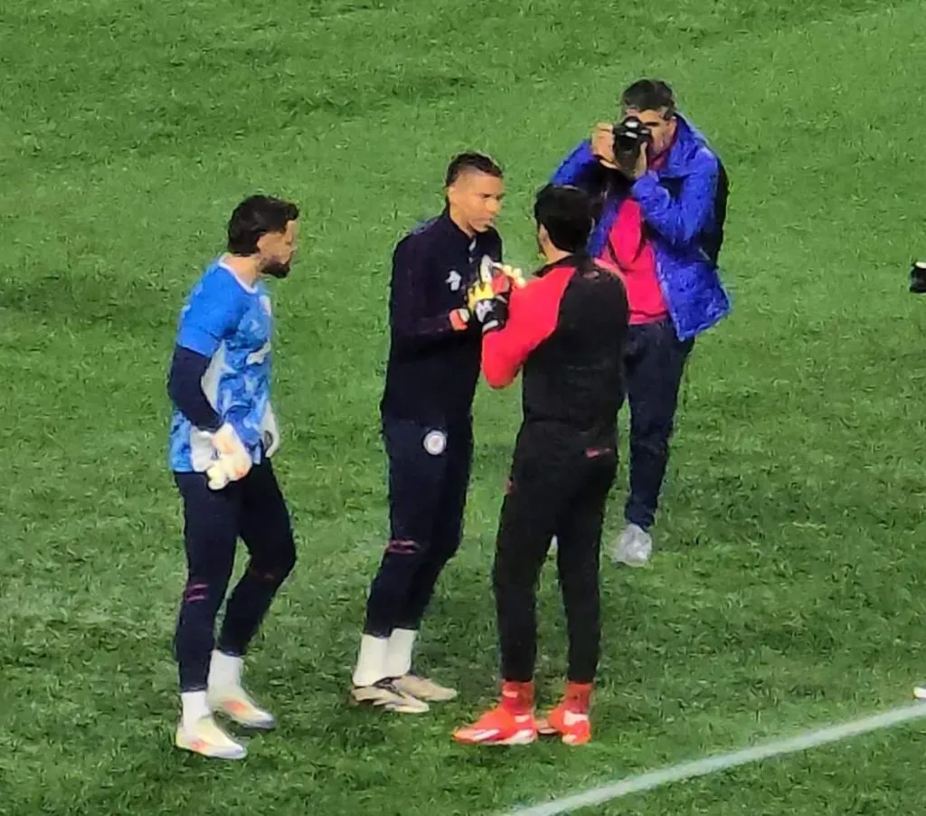 La foto entre Mier, Corona y Gudiño como espectador