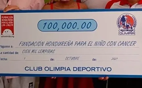 El cheque que Olimpia entregó a la Fundación Hondureña para el Niño con Cáncer (Foto: Nación Olimpista)