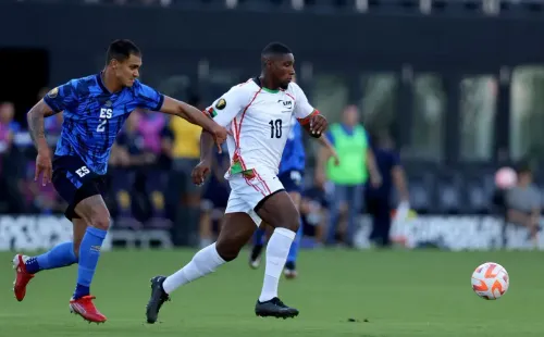 Roberto Domínguez of El Salvador and Brighton Labeau of Martinique. (Photo by Megan Briggs/Getty Images)