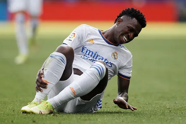 Vinicius Junior of Real Madrid lies injured on the pitch during the La Liga Santander match between RCD Espanyol and Real Madrid CF at RCDE Stadium on October 3, 2021 in Barcelona, Spain. (Photo by Jose Breton/Pics Action/NurPhoto via Getty Images)