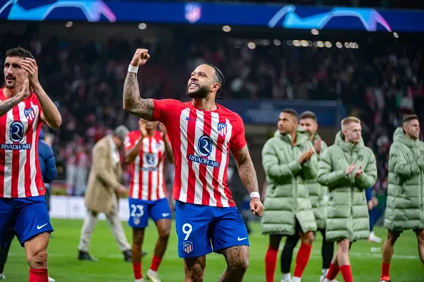 Memphis Depay del Atlético de Madrid celebra la victoria en la Champions League. Foto: Getty Images