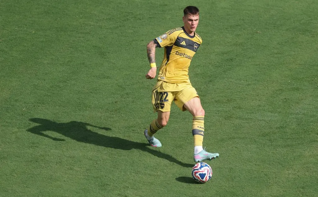Kevin Zenón, respaldado por Miguel Russo. (Getty)