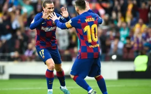 Griezmann festeja junto a Lionel Messi (Getty Images)