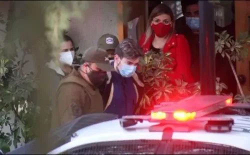 Nano Calderón en custodia de Carabineros.