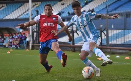 Armando Mendez of Nacional D Hector Fertoli of Racing Club - Photo by Marcelo Endelli/Getty Images-Not Released (NR)