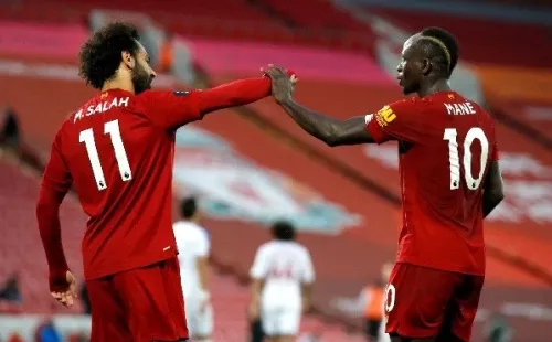 De la mano de Salah y Mané los de Klopp están ampatados en puntos con el Tottenham en la punta de la Premier League. (Foto: Getty)