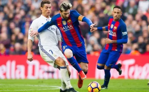 Lionel Messi y Cristiano Ronaldo, cuando eran rivales en la Liga Española. (Foto: Getty Images)