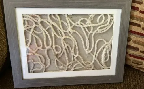 Un pedazo de malla del arco sur del Estadio Nacional el día que Chile ganó la Copa América 2015, es uno de los tesoros familiares (Cristopher Antúnez – Redgol)