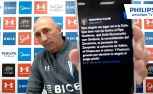 Paulucci mostrando el mensaje que Boric escribió a favor de Católica.