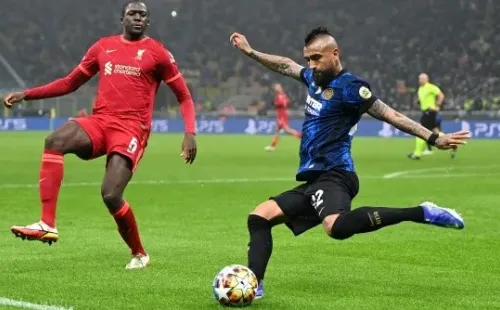 MILAN, ITALY - FEBRUARY 16: Arturo Vidal of FC Internazionale  clears the ball whilst under pressure from Ibrahima Konate of Liverpool during the UEFA Champions League Round Of Sixteen Leg One match between Inter and Liverpool FC at Giuseppe Meazza Stadium on February 16, 2022 in Milan, Italy. (Photo by Shaun Botterill/Getty Images)-Not Released (NR)