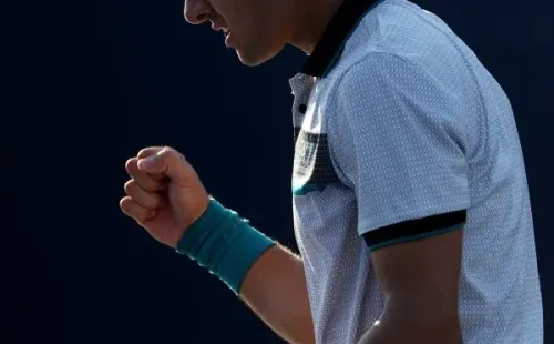 Garin festeja su triunfo en el debut del US Open