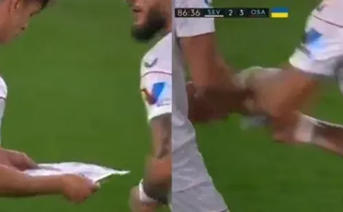 Momento en que Acuña le quita el papel a Torres para destrozarlo. | Captura.