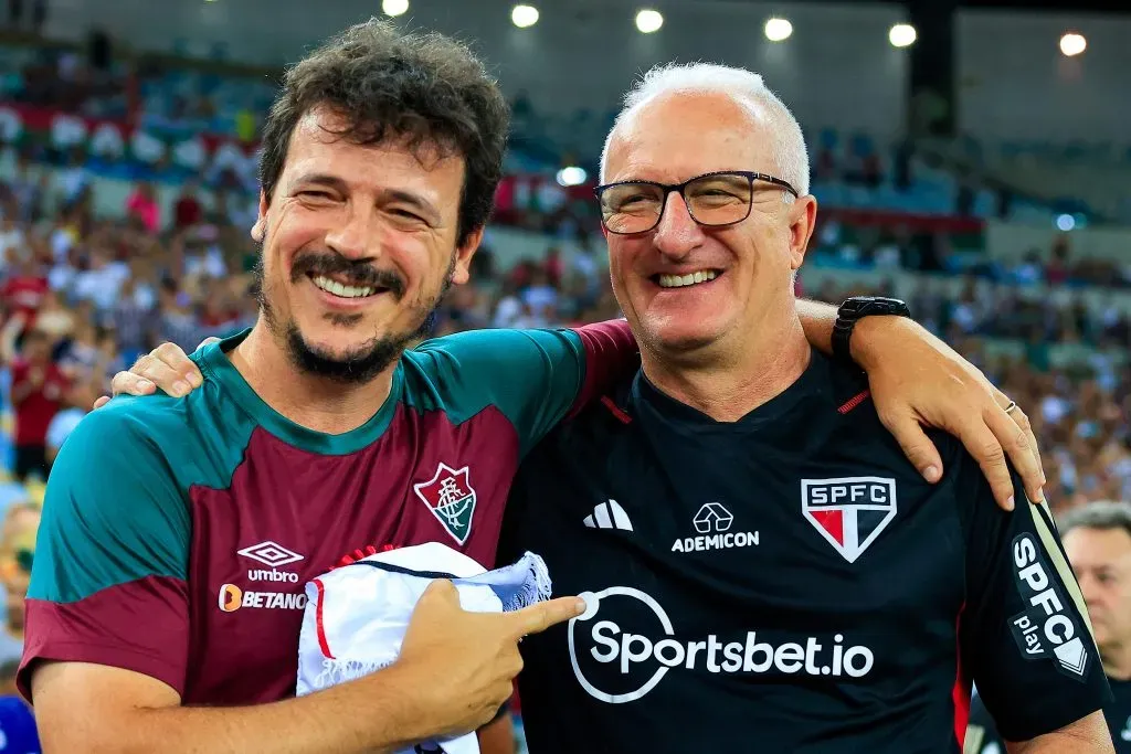 Fernando Diniz, despedido de la selección brasileña, y Dorival Junior, su nuevo técnico. Antes sonreían juntos | Getty Images