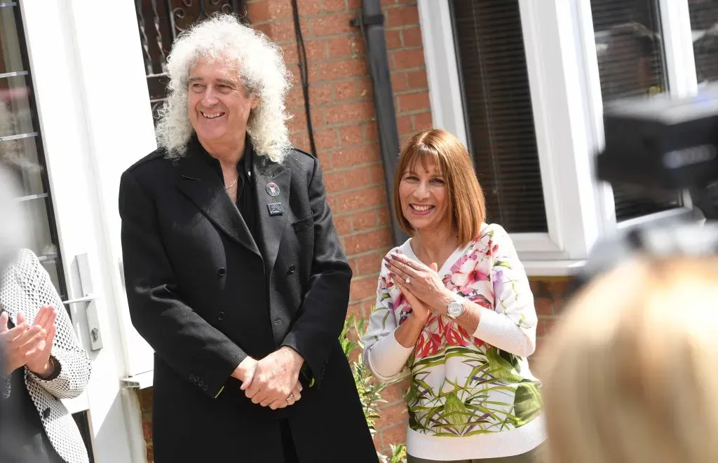 FELTHAM, ENGLAND – SEPTEMBER 01:  Brian May and Kashmira Cooke (Freddie Mercury’s sister) attend the unveiling of an English Heritage Blue Plaque, commemorating where Freddie Mercury lived on September 1, 2016 in Feltham, England.  (Photo by Stuart C. Wilson/Getty Images)