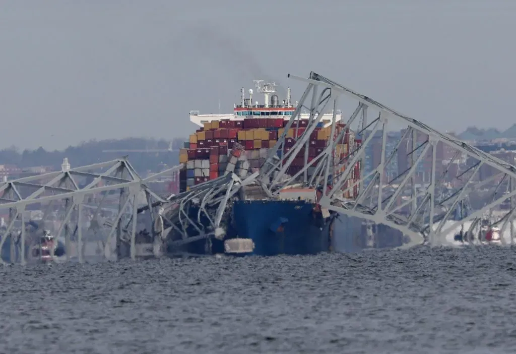 PASADENA, MARYLAND – MARCH 26:  Cargo ship The Dali is shown after running into and collapsing Baltimore’s Francis Scott Key Bridge on March 26, 2024 in Pasadena, Maryland.  Rescuers are searching for at least seven people, authorities say, while two others have been pulled from the Patapsco River (Photo by Kevin Dietsch/Getty Images)