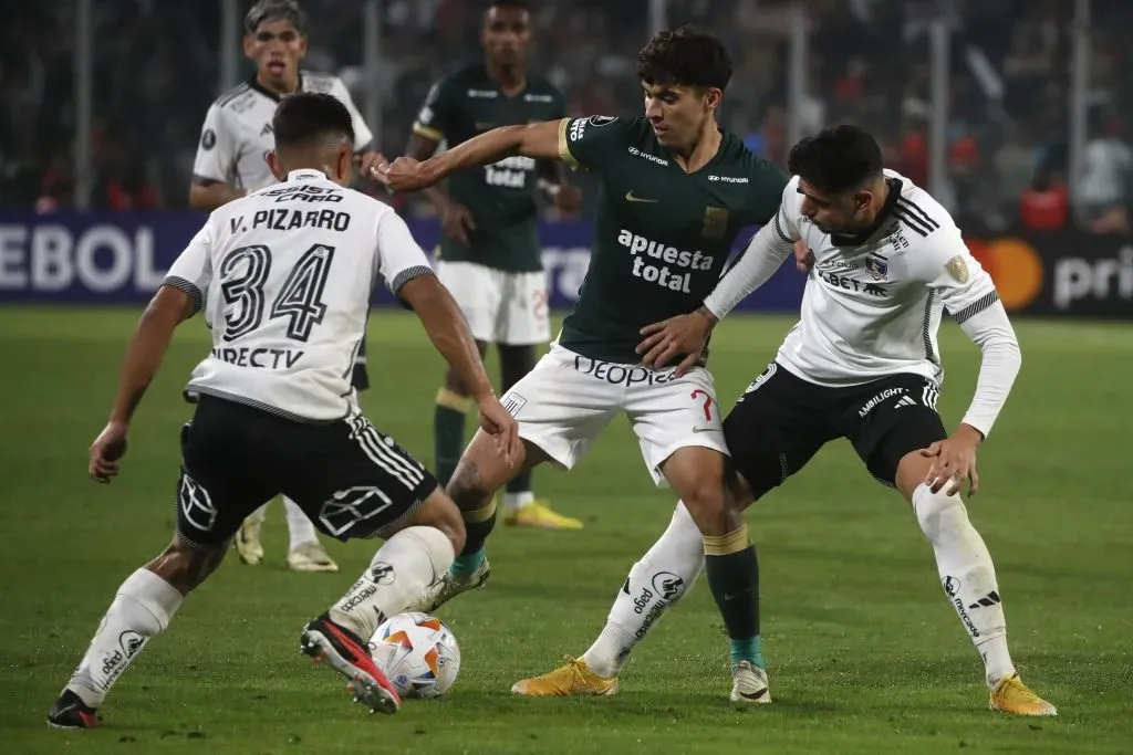 Vicente Pizarro y Carlos Palacios ante Alianza Lima. (Jonnathan Oyarzun/Photosport).