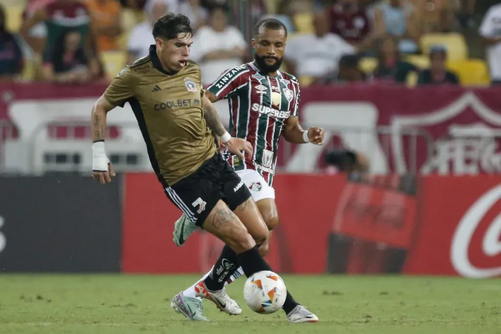 Carlos Palacios en un duelo ante Samuel Xavier en el Maracaná. (Pier Giorgio/Photosport).