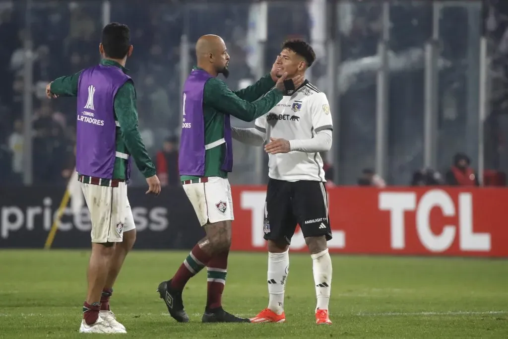 Felipe Melo fue cariñoso con Alan Saldivia dentro y fuera de la cancha. (Jonnathan Oyarzun/Photosport).