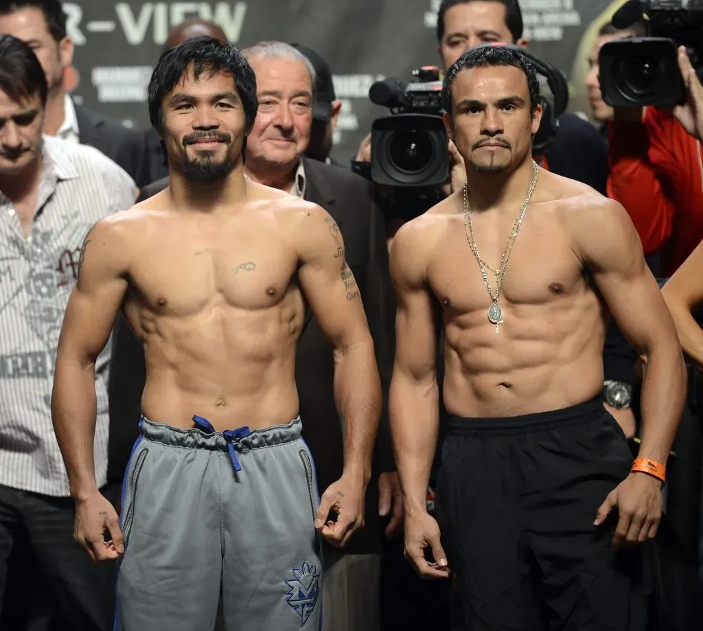 Manny Pacquiao (izq) y Juan Manuel Márquez (der) en la previa de su combate en 2012. (Foto: Jeff Bottari/Getty Images)
