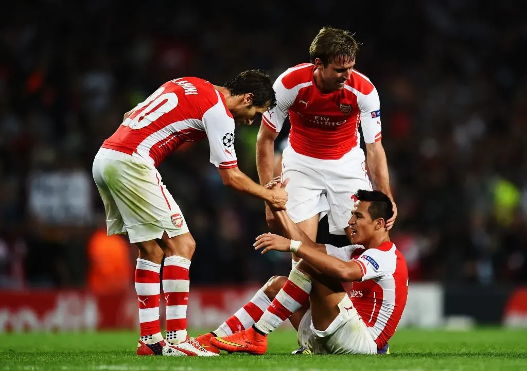 Flamini junto a Alexis Sánchez en el Arsenal inglés. (Shaun Botterill/Getty Images).