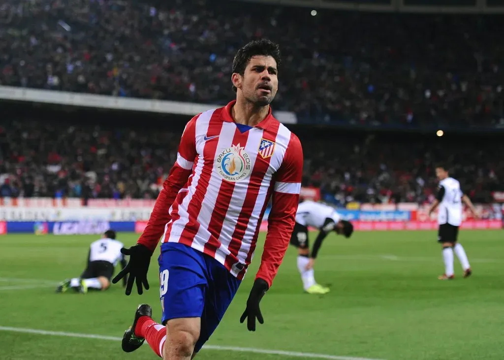 MADRID, SPAIN – DECEMBER 15: Diego Costa of Club Atletico de Madrid celebrates after scoring Atletico’s opening goal during the La Liga match between Club Atletico de Madrid and Valencia CF at Vicente Calderon Stadium on December 15, 2013 in Madrid, Spain. (Photo by Denis Doyle/Getty Images)