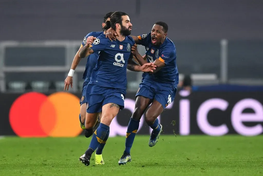 Sergio Oliveira of Porto celebrates with Wilson Manafa (Photo by Valerio Pennicino/Getty Images)