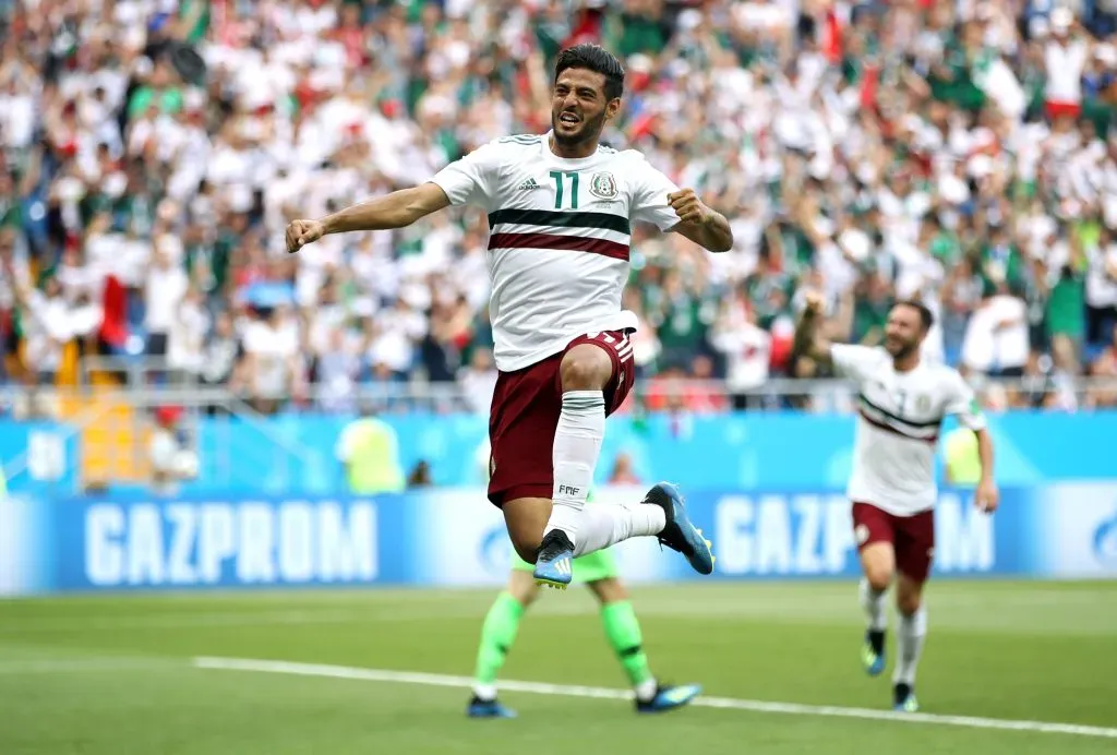 Carlos Vela celebrando gol pelo México. (Photo by Clive Brunskill/Getty Images)