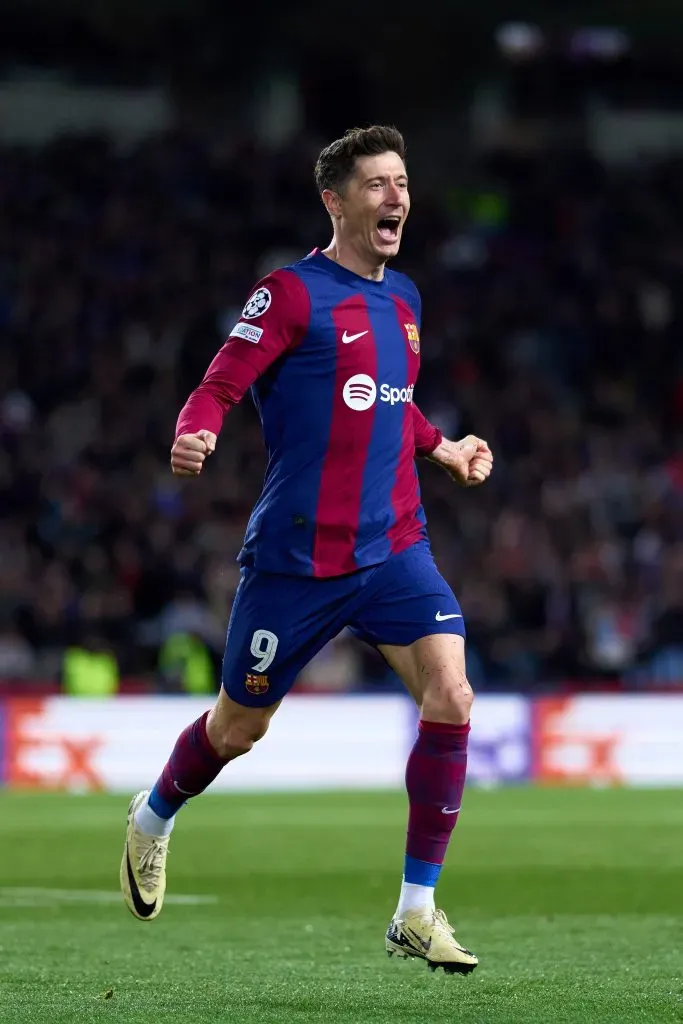 BARCELONA, SPAIN – MARCH 12: Robert Lewandowski of FC Barcelona celebrates after scoring his team’s third goal during the UEFA Champions League 2023/24 round of 16 second leg match between FC Barcelona and SSC Napoli at Estadi Olimpic Lluis Companys on March 12, 2024 in Barcelona, Spain. (Photo by Alex Caparros/Getty Images) (Photo by Alex Caparros/Getty Images)