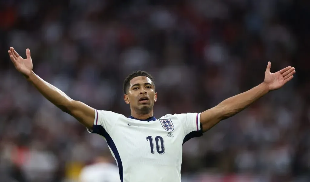 GELSENKIRCHEN, GERMANY – JUNE 16: Jude Bellingham of England celebrates scoring his team’s first goal during the UEFA EURO 2024 group stage match between Serbia and England at Arena AufSchalke on June 16, 2024 in Gelsenkirchen, Germany. (Photo by Kevin C. Cox/Getty Images)
