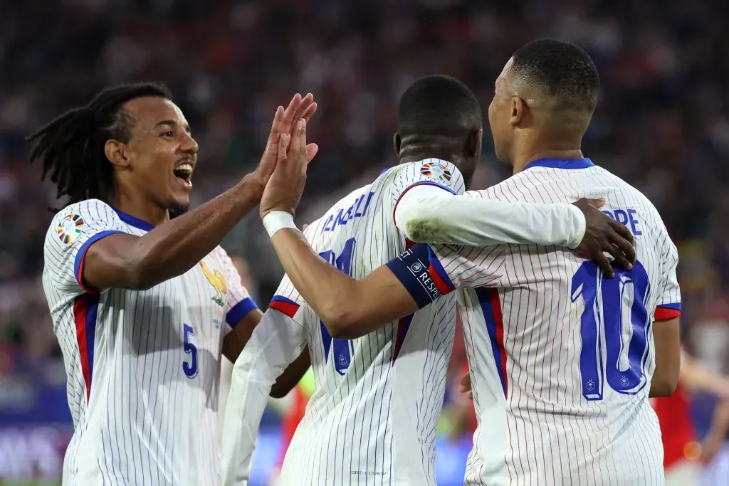 Atletas da França vibram após gol da vitória sobre a Áustria na Eurocopa. (Photo by Kevin C. Cox/Getty Images)