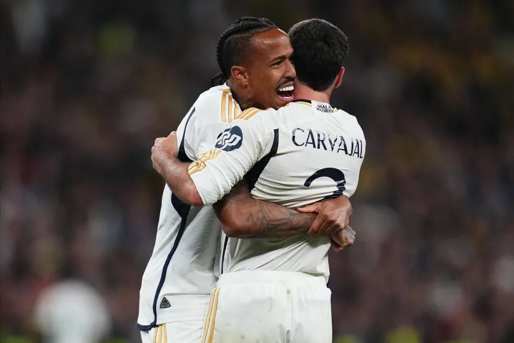 Eder Militão e Daniel Carvajal comemoram a conquista do Real Madrid na última Champions League. Foto: IMAGO / Pressinphoto.
