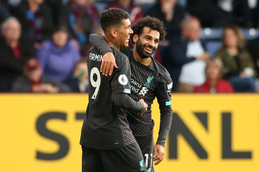 Firmino ao lado de Salah (Photo by Jan Kruger/Getty Images)