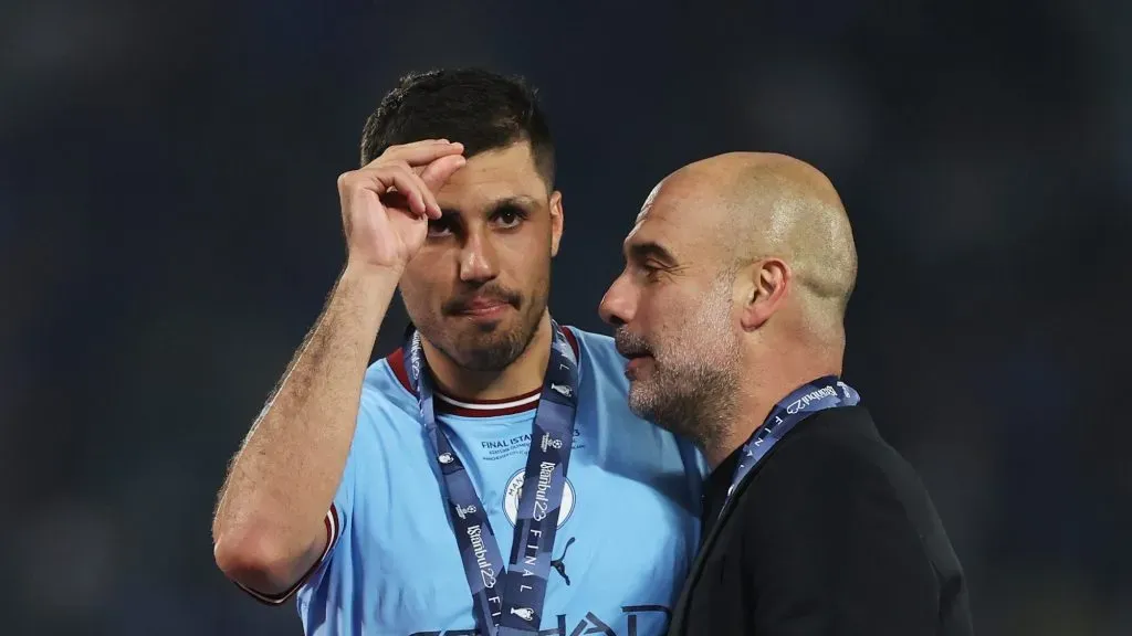 Rodri e Guardiola. (Photo by Michael Steele/Getty Images)