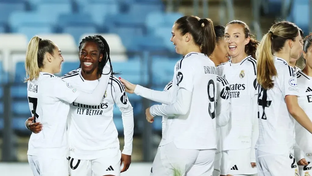 MADRID, SPAIN – NOVEMBER 13: Naomie Feller of Real Madrid (2L) celebrates scoring her team’s third goal with teammates Olga and Signe Bruun during the UEFA Women’s Champions League match between Real Madrid CF and FC Twente at Estadio Alfredo Di Stefano on November 13, 2024 in Madrid, Spain. (Photo by Florencia Tan Jun/Getty Images)
