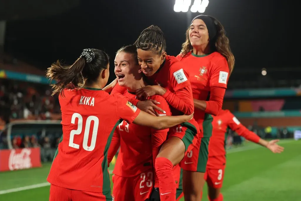 HAMILTON, NEW ZEALAND – JULY 27: Telma Encarnacao (2nd L) of Portugal celebrates with teammates after scoring her team’s first goal during the FIFA Women’s World Cup Australia & New Zealand 2023 Group E match between Portugal and Vietnam at Waikato Stadium on July 27, 2023 in Hamilton, New Zealand. (Photo by Phil Walter/Getty Images)