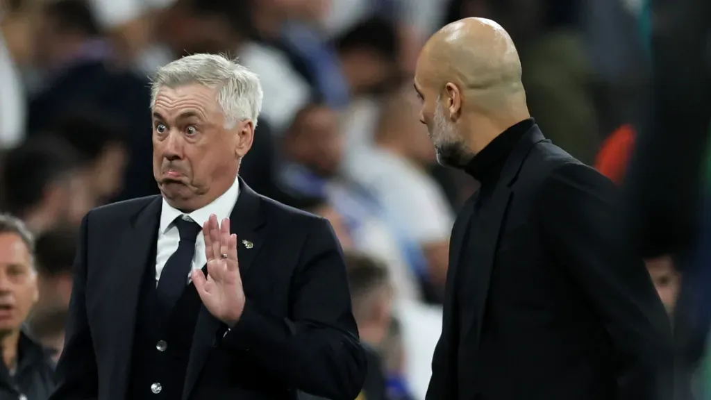 Carlo Ancelotti e Guardiola em confronto da Champions League (Photo by Clive Brunskill/Getty Images)
