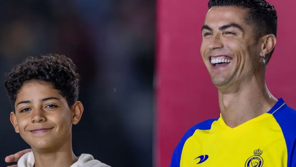Cristiano Ronaldo e seu filho Cristiano Ronaldo Jr durante apresentação oficial no Al-Nassr. Foto de Yasser Bakhsh/Getty Images